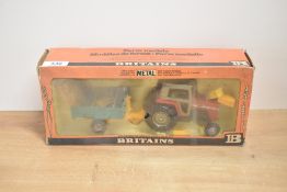 A 1979 Britains 1:32 scale metal and plastic model set, 9598 Massey Ferguson & Trailer, in