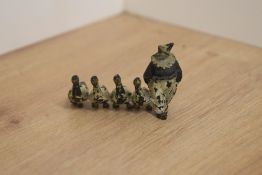 A Lead possible Britains Clown with four Ducks, length 6cm