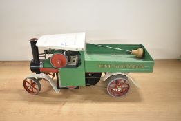 A Mamod Live Steam Wagon in green and white, burner present