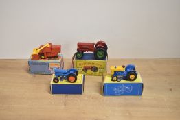 Four Matchbox die-casts, 1969 No 39 Ford Tractor in blue and yellow with yellow hubs, 1961-65 No