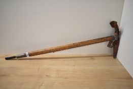 A vintage Stubai Schenbrenner Fuhrerpickel, Ges, Gesch Ice Axe, with leather covers, length 82cm