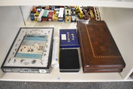 A shelf of mixed Toys, Mahogany Backgammon/Chess case, Codswallop, The Box of Stars, Snatch, The
