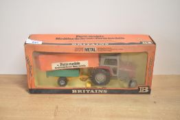 A 1979 Britains 1:32 scale metal and plastic model set, 9598 Massey Ferguson & Trailer, in