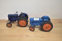 Two Chad Valley die-cast Fordson Tractors, light blue Major with orange wheels hubs and dark blue