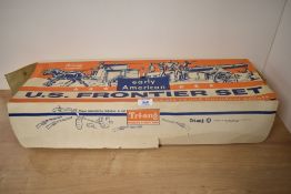 A Tri-ang plastic set, Early American US Frontier Set, two horses, cart and driver, gun carriage