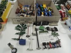 A collection of Matchbox and similar Tractors all playworn, along with Britains Figures and