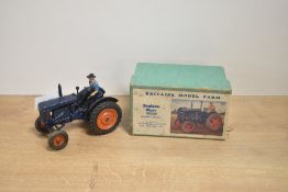 A Britains die-cast, 128F Fordson Major Tractor, rubber tyres, driver present, in original box