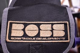 A Boss Tackle developments rod carry bag containing 2 Dunlop 3pc 11ft carp rods and rod rests
