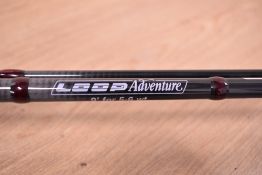 Two fishing rods, Daiwa graphite sensor Z (two piece) approx. 270cm and two piece Loop Adventure fly