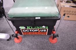 A padded on the bank seat with storagge box containing 6 spinning reels including Abu Cardinal 63,