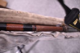 Three vintage rods, varying sizes