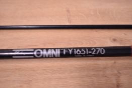 A shakespeare 2pc omni fly rod 2.7meters and a 10ft split cane spinning rod in original soft sleeve