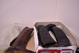 2 sets of riding boots one simulated leather and a set of brown leather boots in a harry hall boot