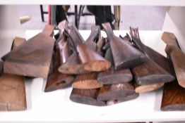 A shelf of old gunstocks and a few locks