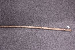 A walking stick made from sharks vertbrae 113 individual sections measuring 87.5cm long