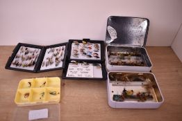 A small selection of pocket fly boxes and contents