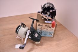 Two vintage fishing reels. An Abu Cardinal 66 in very nice condition and a Penn Leveline 350M in its