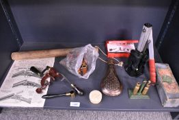 A box containing gun cartridge loading equipment