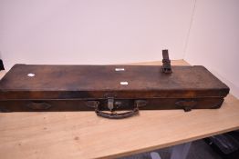 A Leather fitted gun case by Morrow and co Halifax measuring 82cm x 21cm x 10cm the catch works