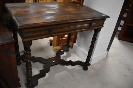 A late 19th Century oak side table having X stretcher, width approx. 84cm