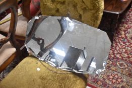 A vintage frameless wall mirror, approx. 66 x 38cm