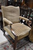 A Gainsborough style mahogany framed easy armchair