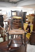 A Victorian rush seated rocking chair