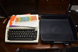 A vintage Adler Tippa typewriter in integral case