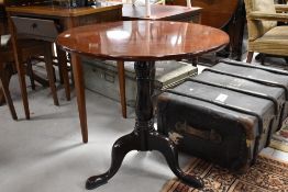 A Victorian mahogany pedestal table having circular top, turned column and triple splay legs,