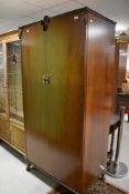 A vintage mahogany Gentleman's wardrobe, width approx. 90cm