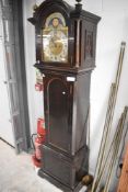 An early 20th Century mahogany cased longcase clock having eight day movement with moonphase brass