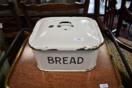 A vintage enamelled bread bin