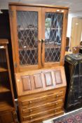 A Cryer craft elm bureau bookcase