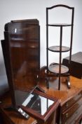 An early 20th Century oak cake stand, a vintage metamorphic firescreen (converts to tea or card