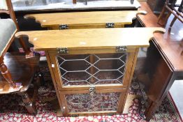 A pair of Priory or Old Charm style wall mounted glazed cabinets