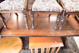 A vintage Priory style refectory style dining table