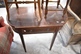 An Edwardian mahogany side table having inlaid decoration, width approx. 91cm