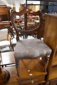 A Victorian mahogany balloon back dining chair