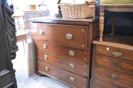 A Victorian mahogany secretaire chest of drawers having satinwood interior fittings