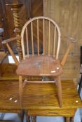 A vintage Ercol carver chair, having impressed mark (290) to seat back