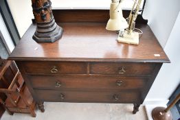 An early 20th Century oak bedroom chest of two over two drawers on twist legs, width approx. 107cm