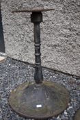 An Art Nouveau style cast table base of tulip form