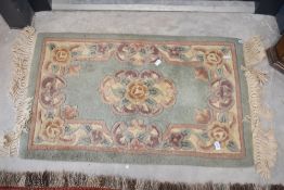 A Chinese fireside rug, approx. 80 x 50cm