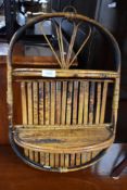A vintage bamboo wall shelf