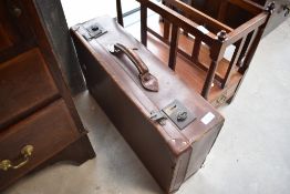 A vintage carded leather travel case