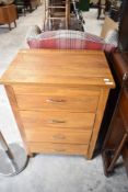 A modern golden oak bedroom chest of four drawers, width approx. 63cm