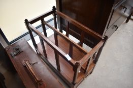 A reproduction mahogany Canterbury