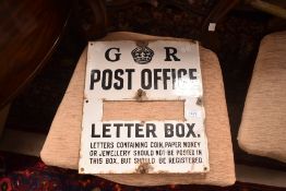 A vintage enamelled post box sign