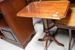 A reproduction mahogany occasional table in the Victorian style