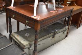 A Victorian mahogany side table, with frieze drawer to one end, dummy drawer to other end, approx.